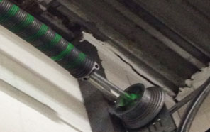 Broken Torsion spring garage door Rochester